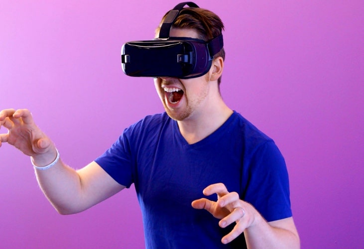 an image of a man wearing VR glasses
